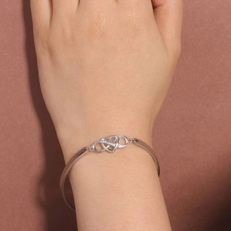 K & S | Damen Armreif Unendlichkeit mit Kristall Herz – Eleganter Schmuck & Romantische Geschenkidee