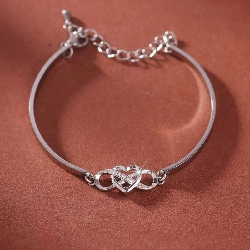K & S | Damen Armreif Unendlichkeit mit Kristall Herz – Eleganter Schmuck & Romantische Geschenkidee