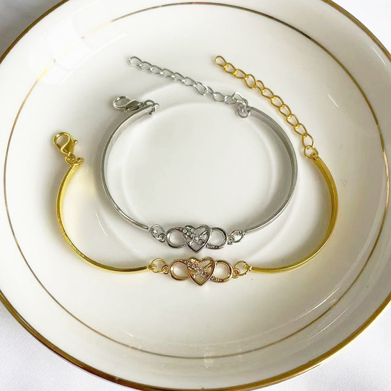 K & S | Damen Armreif Unendlichkeit mit Kristall Herz – Eleganter Schmuck & Romantische Geschenkidee