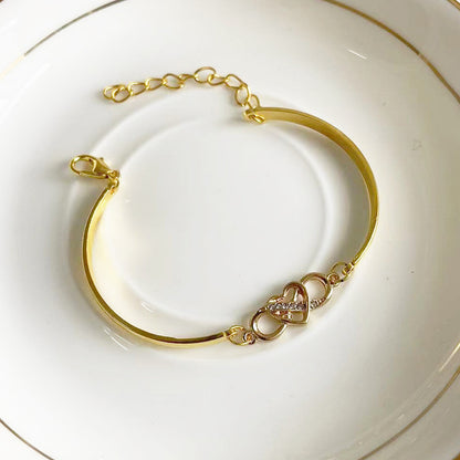 K & S | Damen Armreif Unendlichkeit mit Kristall Herz – Eleganter Schmuck & Romantische Geschenkidee