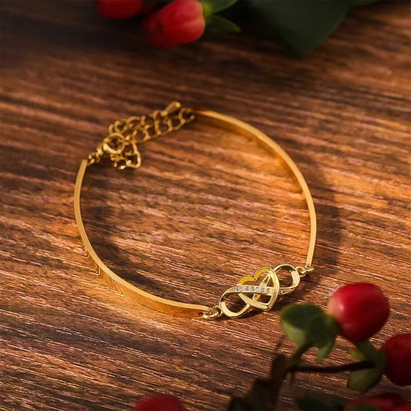 K & S | Damen Armreif Unendlichkeit mit Kristall Herz – Eleganter Schmuck & Romantische Geschenkidee